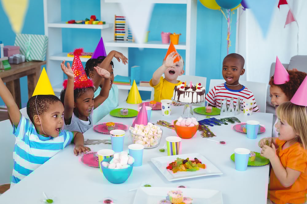 Excited kids enjoying a birthday party together